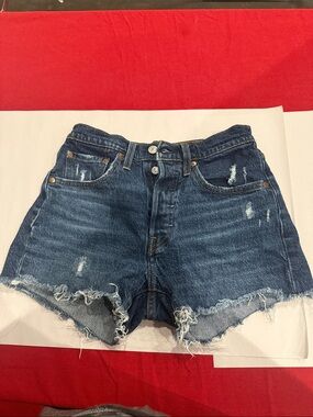 Levi’s 501 Dark Blue Distressed Denim Cutoff Shorts